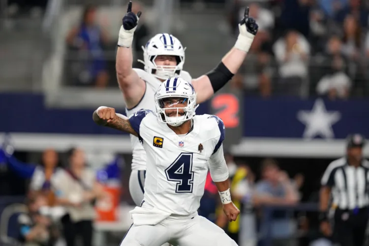 Prescott posts record day against Commanders